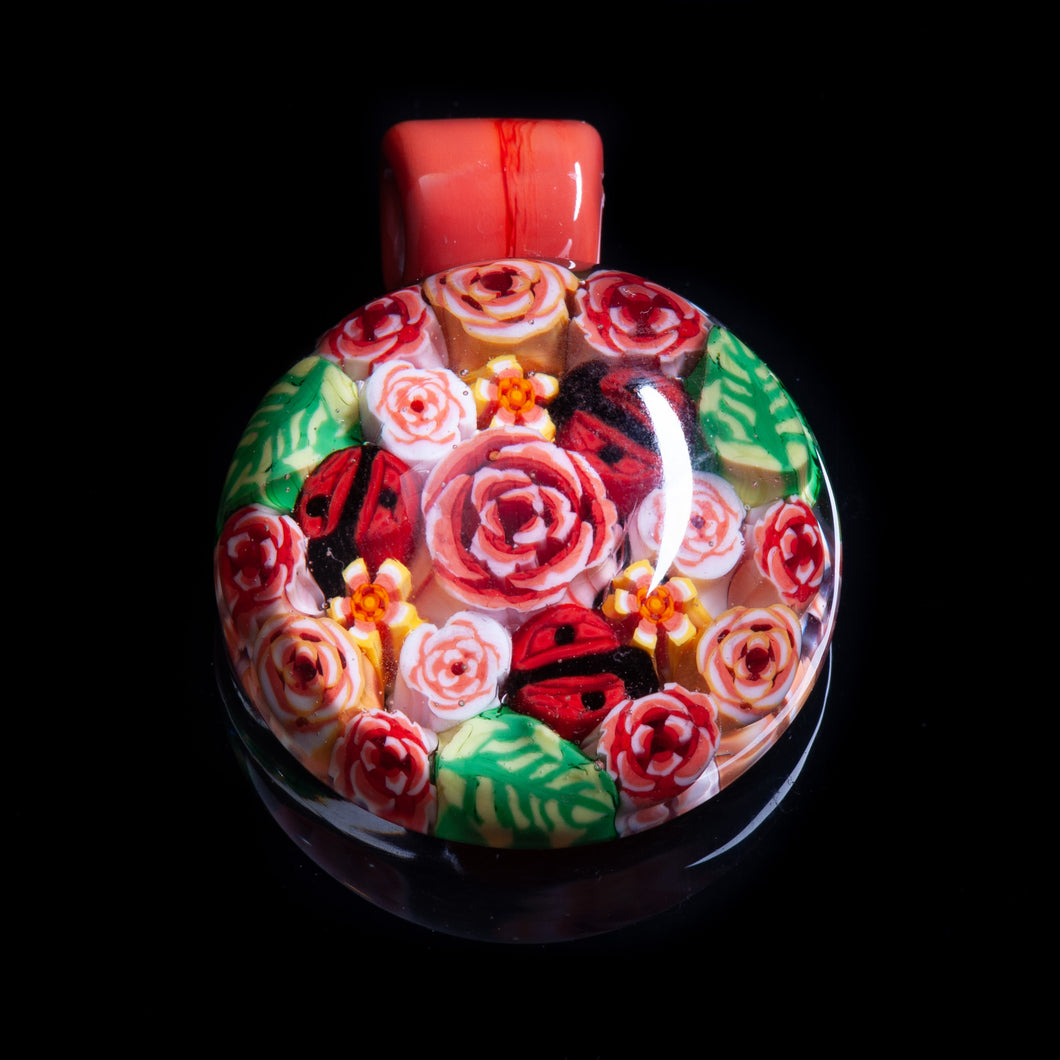 This Artisan Pink / Peach Milliefiori Lampwork Flamework glass pendant necklace