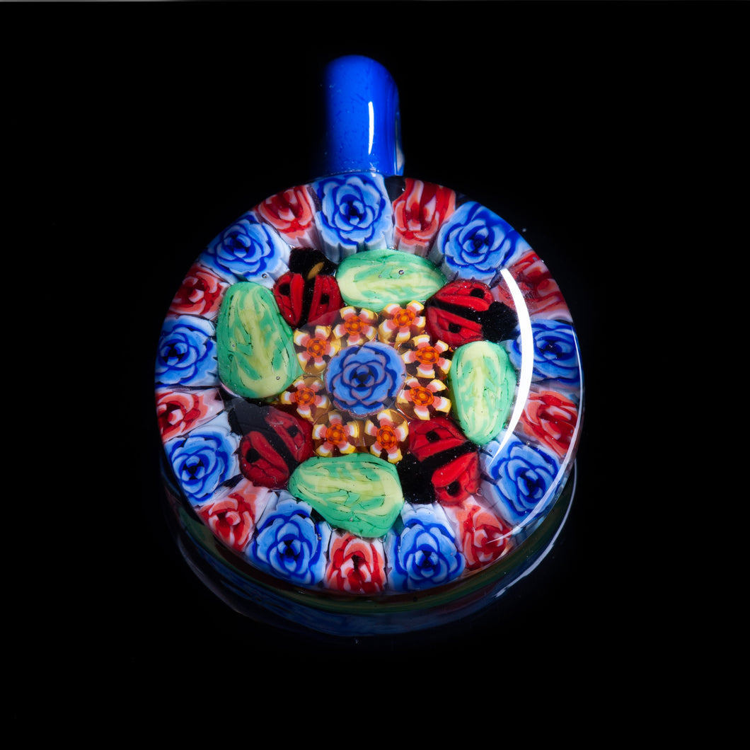 This Artisan Blue with Ladybug Milliefiori Lampwork Flamework glass pendant necklace